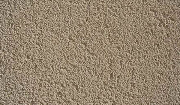 Enduit façade finition grattée